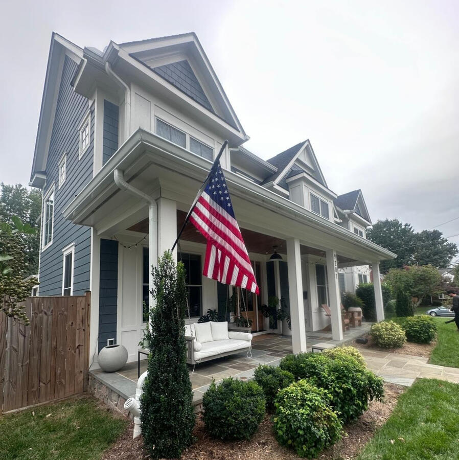 Newly installed 6-inch white seamless aluminum K-style gutters on a home in Bethesda, MD.